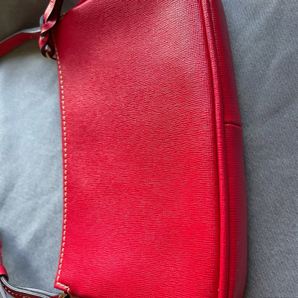 Dooney and Bourk small red handbag. Perfect shape